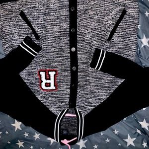 Rebel Wilson for torrid varsity button front jacket